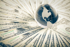 glass globe and money fundraising