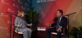 Orlando Bravo of Thoma Braavo with PE Hub's Mary Kathleen (MK) Flynn.