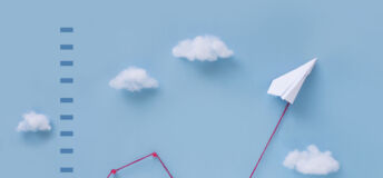 plane pulling business finance growth chart