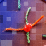 Strings have frayed and severed between pins in a depiction of deglobalisation