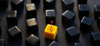 Image of a an arrow hitting a highlighted target.
