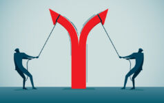 GPs increasingly step up CV alignment with cross-fund commitments two businessmen pull apart an arrow, causing it to point in opposite directions