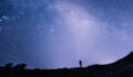 Man staring at a starry sky