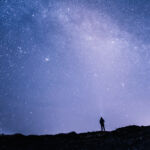 When stratospheric net worth meets LP-GP alignment Man staring at a starry sky